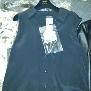 Chanel black button up sleeveless shirt